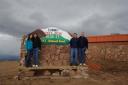 The family at a sign on top of Pike's Peak